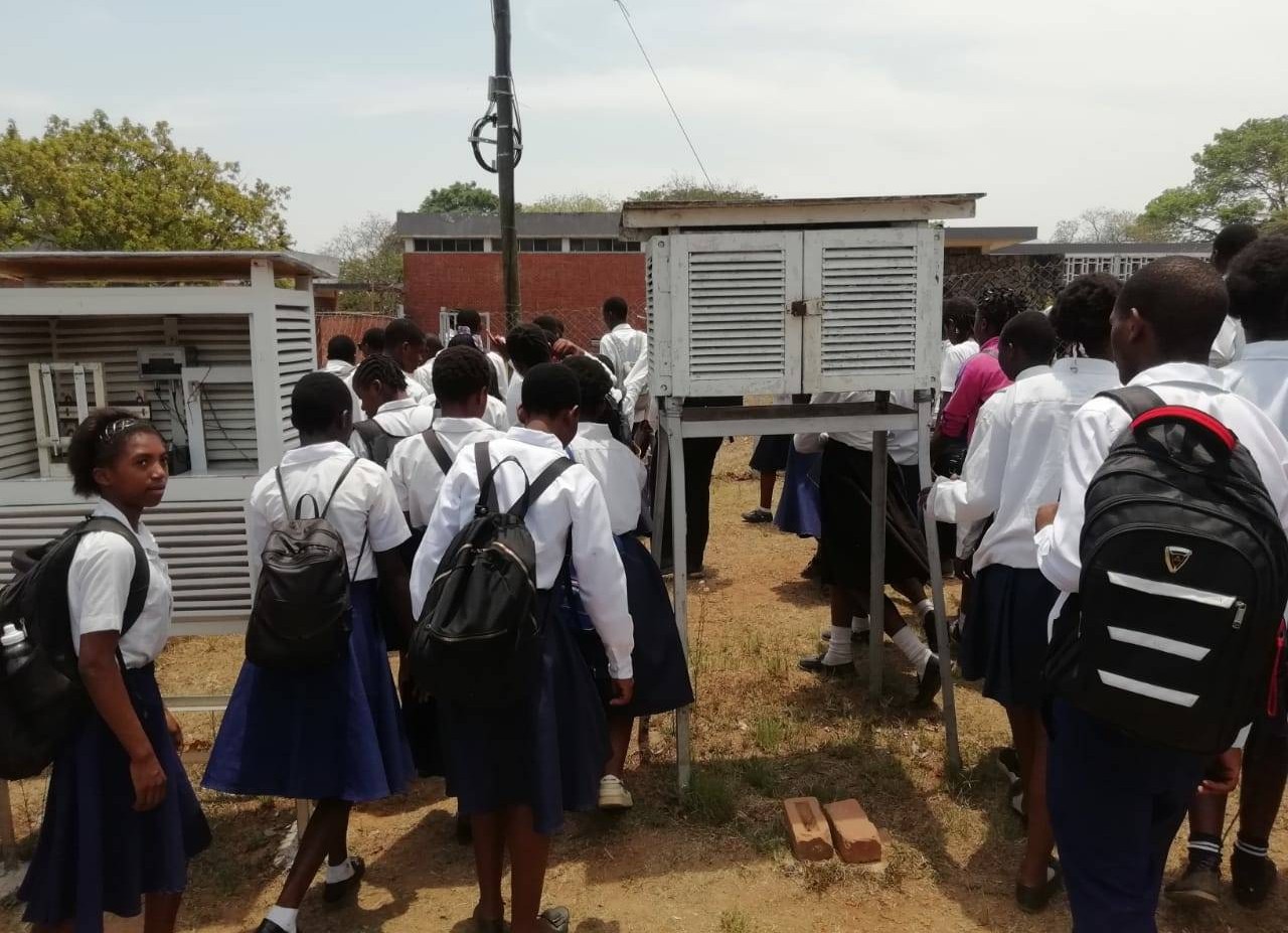 students at the weather station